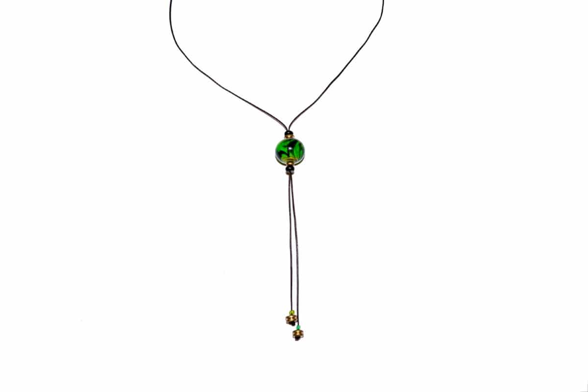 "Green Beat" Necklace Shop by Venezia Autentica - Shop by Venezia Autentica - Sleek necklace with a beautiful green Murano Glass pendant, designed and handmade in Venice, Italy. The pendant, crafted by lampworking, is unique and durable.