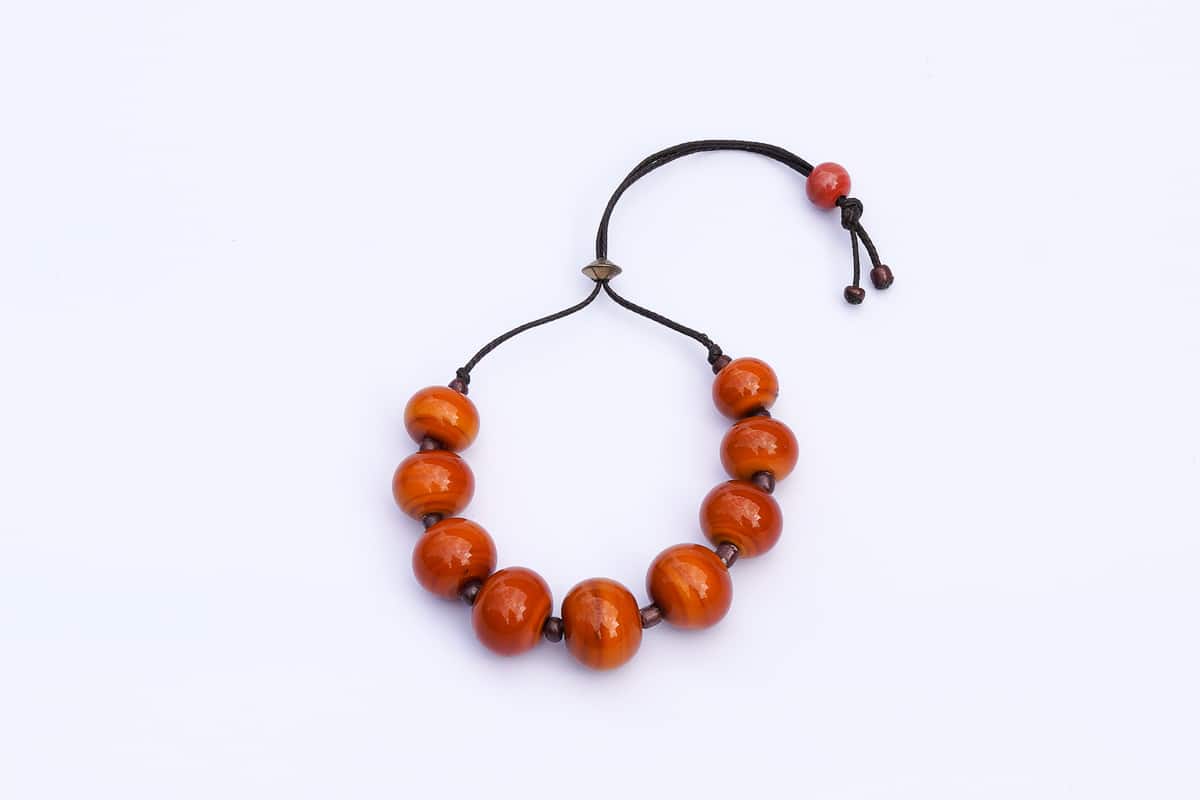 "Murano Jujubes" Bracelet Shop by Venezia Autentica - Shop by Venezia Autentica - Elegant Murano Glass bracelet, with orange beads, designed and handmade in Venice, Italy. Every bead, crafted by lampworking, is unique, beautiful, and durable.