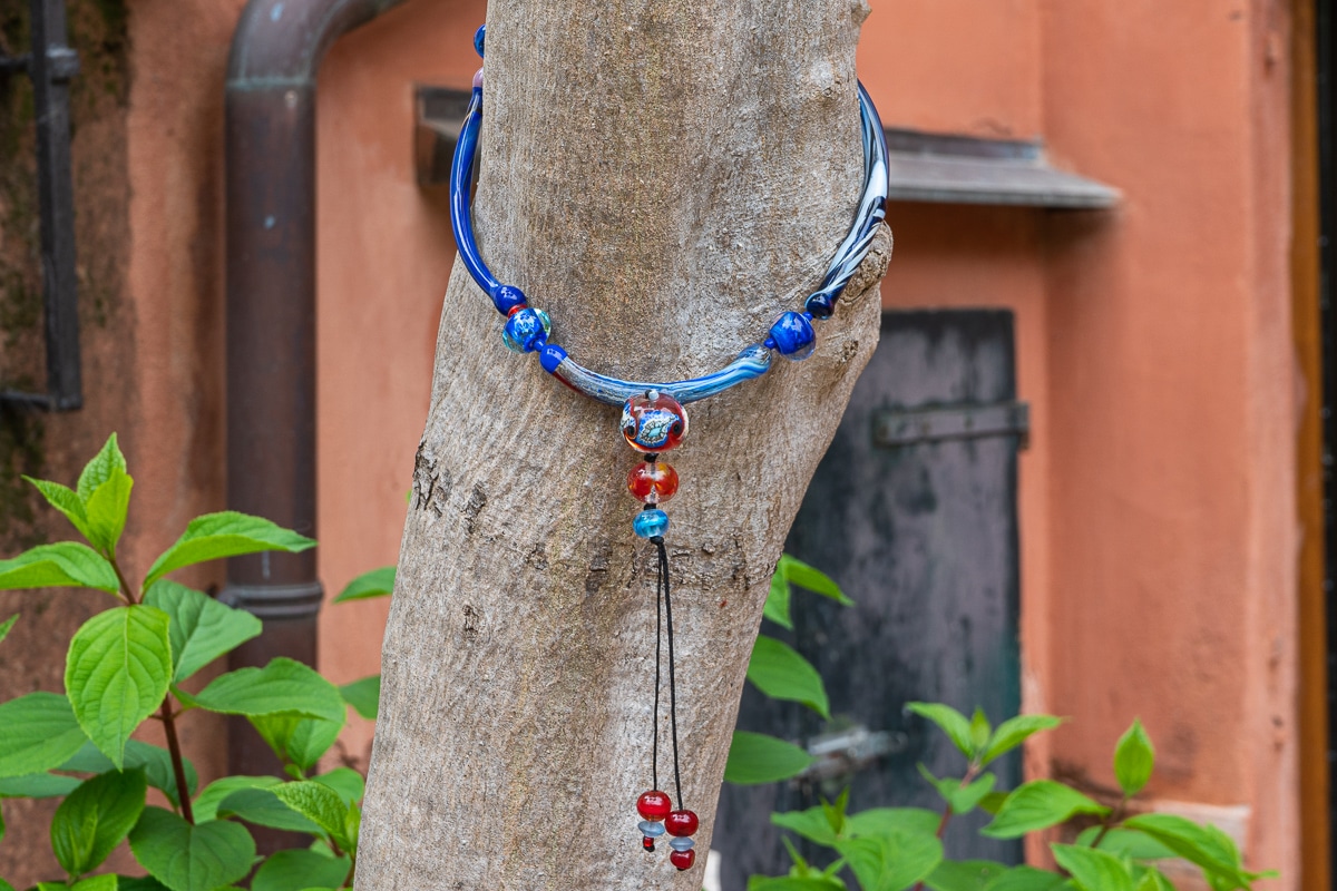 "Red and Blue Spell" Necklace Shop by Venezia Autentica - Shop by Venezia Autentica - Eye-catching blue and red Murano Glass necklace, designed and handmade in Venice, Italy. Beware, its unique colors and shapes make anyone fall in love with it!